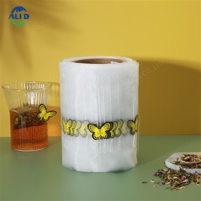 Pyramids Nylonová síťovina trojúhelníkový čajový sáček Balení sáčku Filmová role s provázkem a visačkou